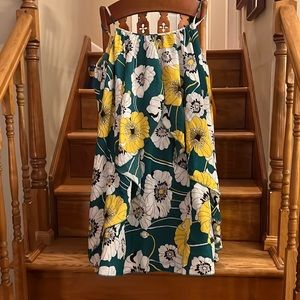 New. Never worn. No tags. Flowered dress, marked 3X, but runs about a size 20.